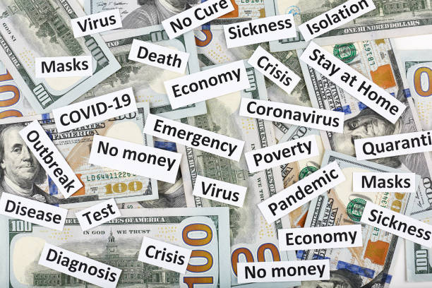istock Coronavirus, COVID-19 headline clippings on 100 USD banknotes 1251231273