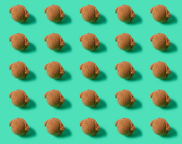 istock rows of chocolate ice cream ball on green background 1251233569