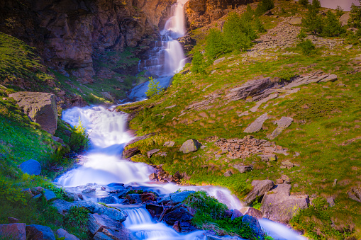 Ethereal falls – cascade landscape, long exposure – Gran Paradiso Alps – Italy