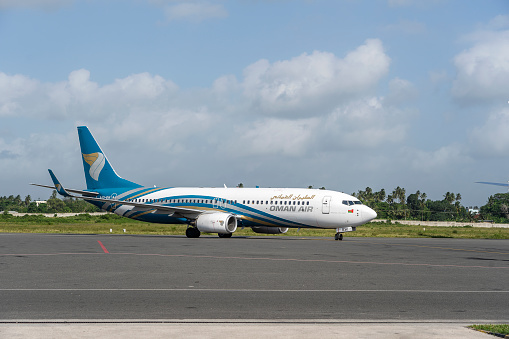 Zanzibar, Tanzania - january 18, 2020 : airplane of Oman Air in the Zanzibar international airport, Tanzania, Africa