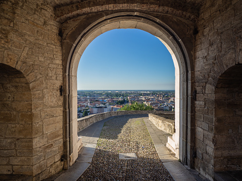 Bergamo, Italy. Amazing view of the lower town through the old gate. Porta San Giacomo. View from the old town. Bergamo one of the beautiful city in Italy