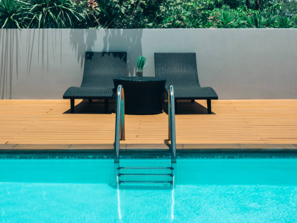 istock Swimming pool background with ladder minimal style. 1251246882