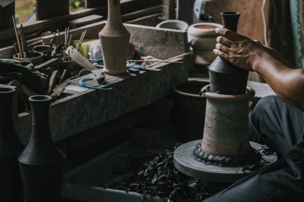 istock Artisan potter making art pot handicraft 1251248143