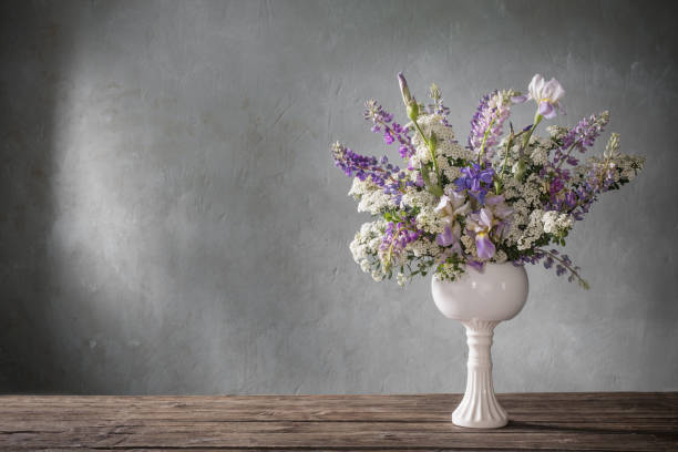 istock summer bouquet in white vase  on gray background 1251249167