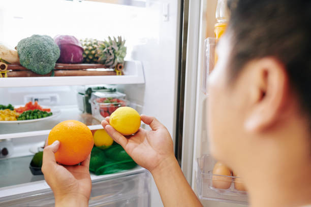 istock Man choosing citrus fruits 1251249251