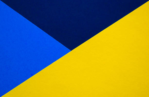 istock Blue and yellow background divided diagonally 1251249573