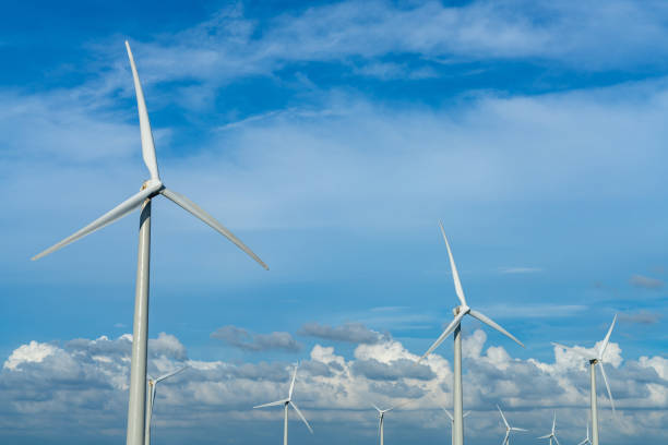 istock Wind turbines or wind energy converter in sunny day 1251253047