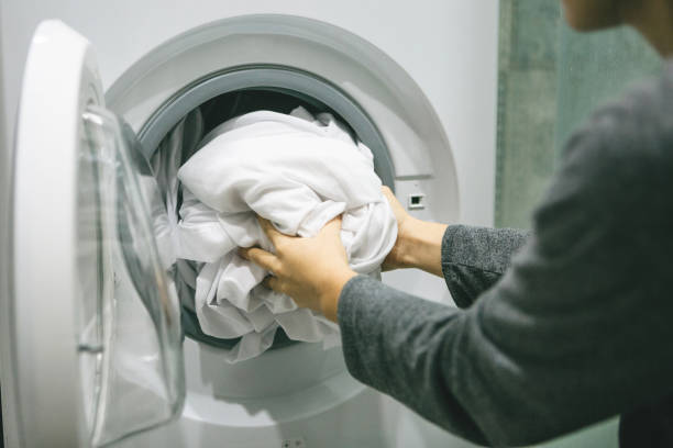 istock A woman puts the laundry 1251254582
