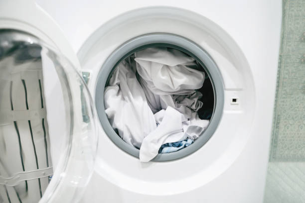 istock Linen in the washing machine. 1251254585