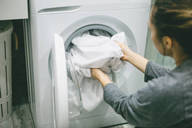 istock A woman puts the laundry 1251254587