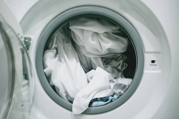 istock Linen in the washing machine. 1251254593