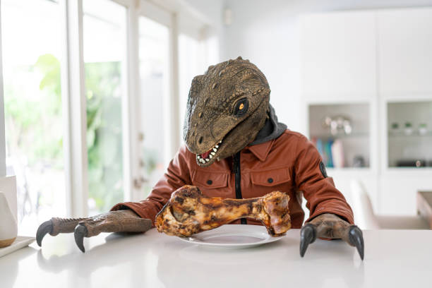 320+ T Rex Costume Stock Photos, Pictures & Royalty-Free Images