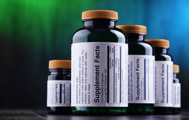 istock Composition with dietary supplement containers. Drug pills 1251259194