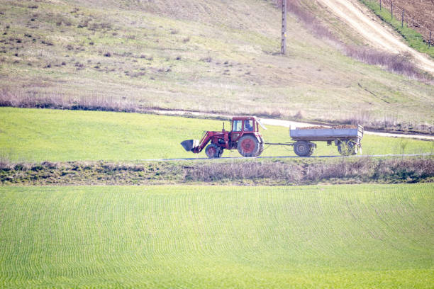 Tractor in a village field