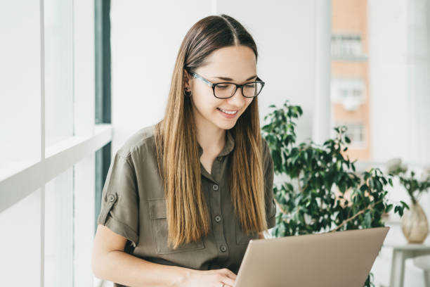 istock Girl working on laptop 1251260678