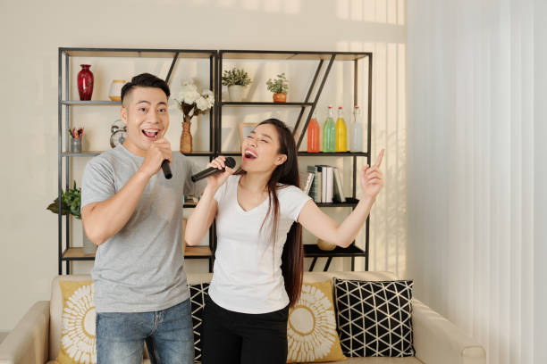 istock Young couple singing songs 1251262437