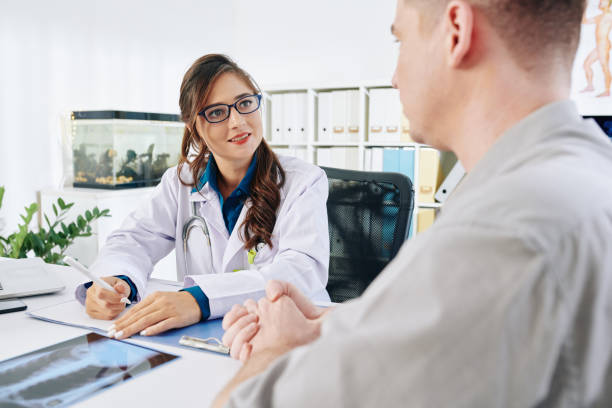 istock Physician listening to patient 1251263376
