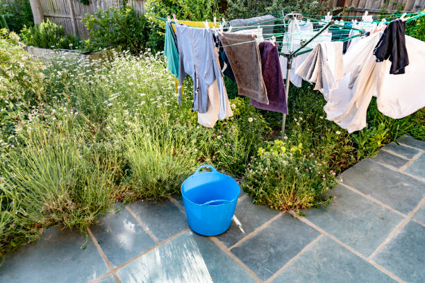 Back garden rotary clothes dryer on a sunny day