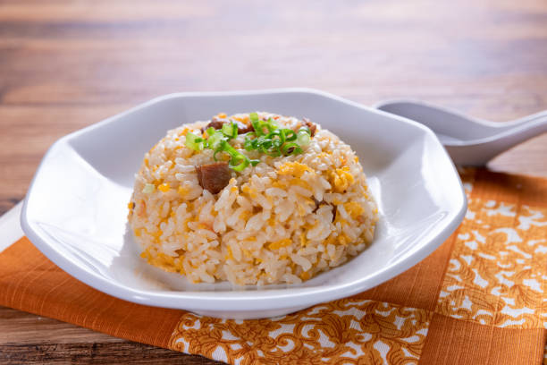 Fried Rice, Chinese Fried rice with some ingredients such as eggs, vegetables, and meat. rice bowl restaurant stock pictures, royalty-free photos & images