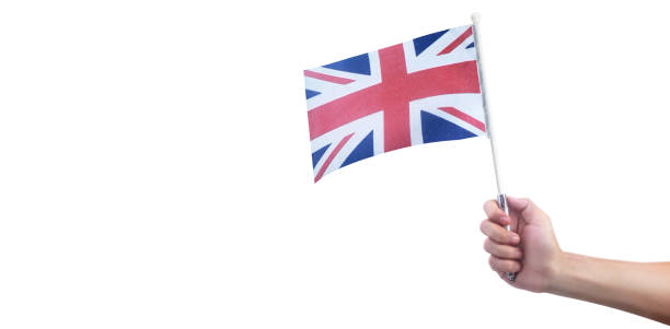 istock Hand holding English flag. flag in hand 1251269364