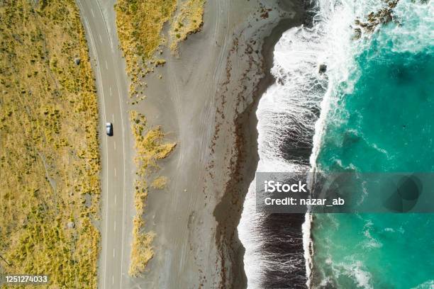 Top View Of Sea Waves And Road Stock Photo - Download Image Now - New Zealand, Sustainable Resources, Road