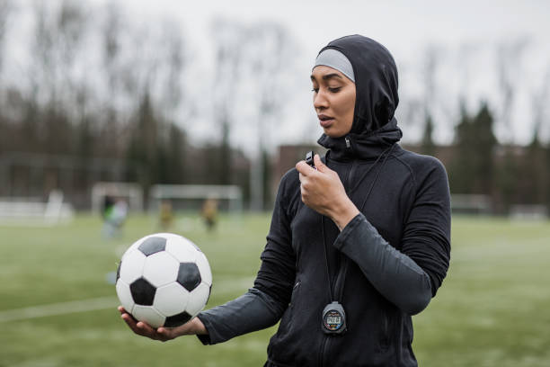 istock Beautiful Young Female Muslim Referee 1251275190