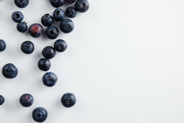Close-up of blueberries on a wooden Board. Fresh berries stock photo