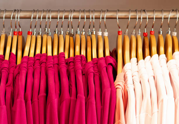 istock Different clothes hanging on the shoulders, front view, the close-up 1251276699