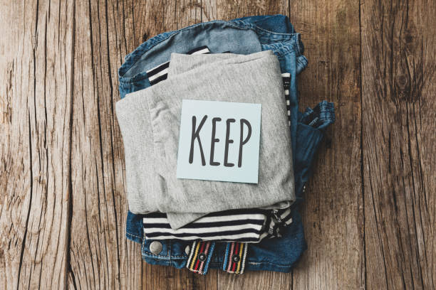 istock Stack of old clothes to keep. Recycling fabric cotton 1251276705
