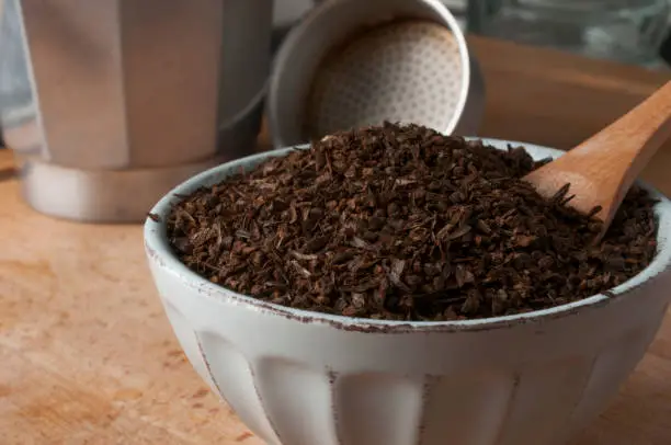 Photo of Bowl of roasted and ground barley for preparation with a coffee maker