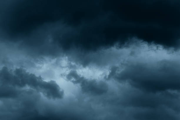 istock Stormy rain big fluffy clouds. Dark sky. Natural scenic abstract background. Weather changes backdrop. Sky filled with voluminous clouds. 1251284556