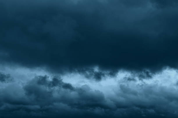 istock Stormy rain big fluffy clouds. Dark sky. Natural scenic abstract background. Weather changes backdrop. Sky filled with voluminous clouds. 1251284604