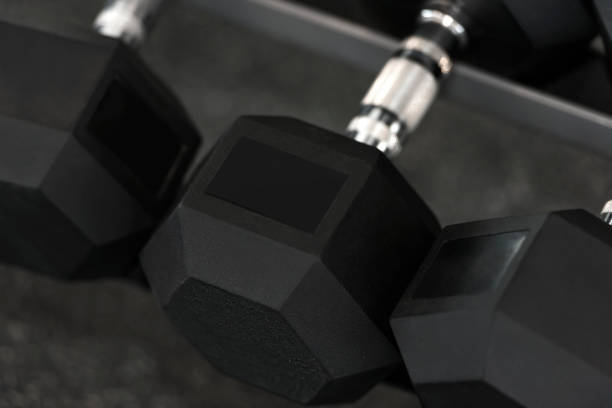 istock Close up view of dumbbells on the rack 1251285367