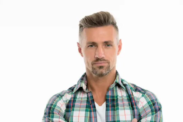Perfect fringe. Styling fringe requires that you apply some pomade or wax and comb hair forward. Fringe hairstyles allow hair volume. Handsome mature man with stylish hairstyle. Barber salon.