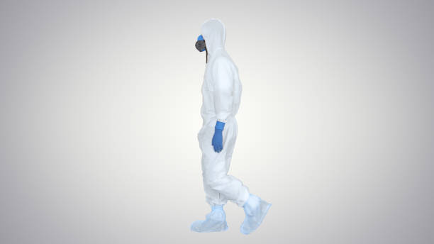 istock Virologist man in protective costume walking in and out on gradient background 1251288779
