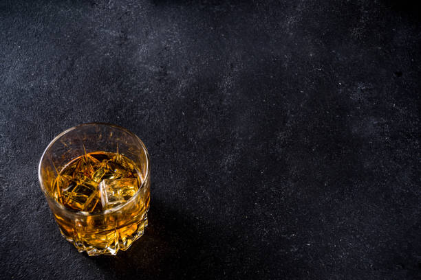 istock Whiskey with ice in glasses 1251293357