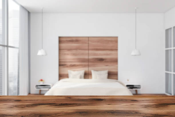 istock Table in white and wood panoramic bedroom 1251301983