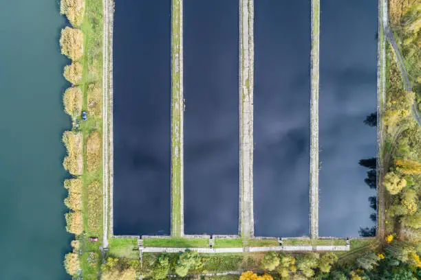 Photo of Abstract sendimentation tank of ironworks water treatment plant in Silesia Poland aerial drone photo view