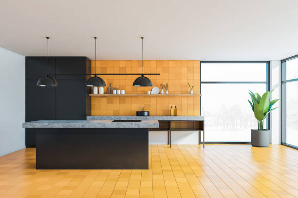istock Yellow and black kitchen with island 1251302417