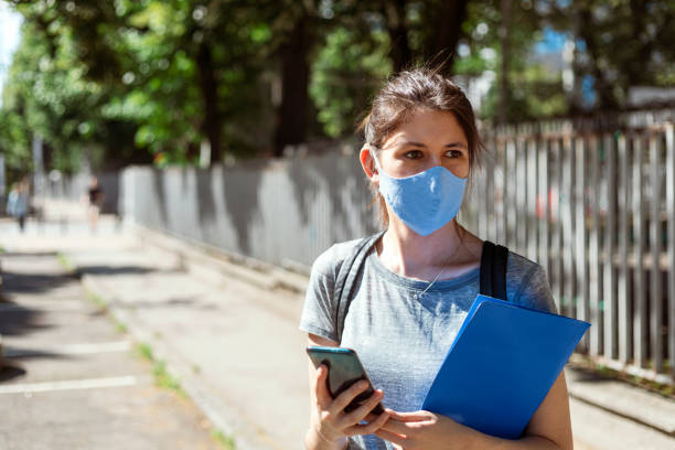 istock Smiling behind the mask 1251303925