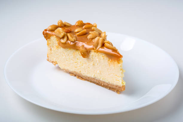 istock Latte coffee with a piece of cheesecake 1251304627