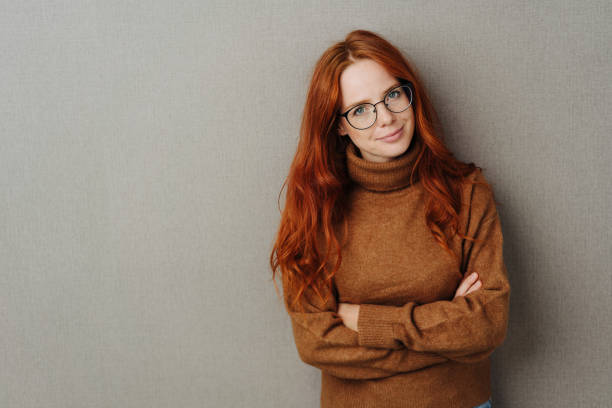 istock Sceptical young woman looking at the camera 1251305003