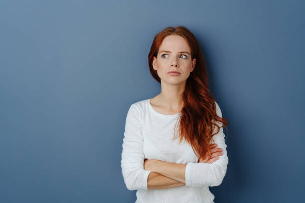 istock Thoughtful jealous young woman looking aside 1251305168