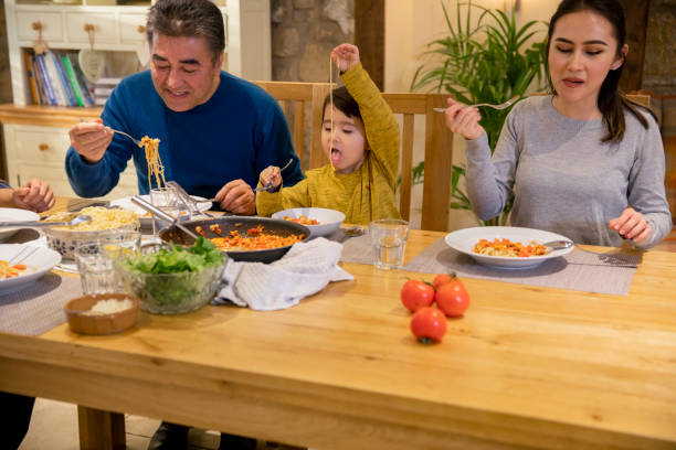 istock Eating Dinner Together As A Family 1251305544