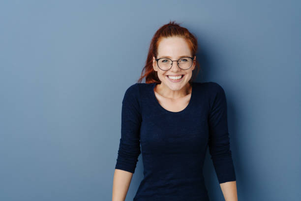 istock Happy friendly young woman with a beaming smile 1251305915