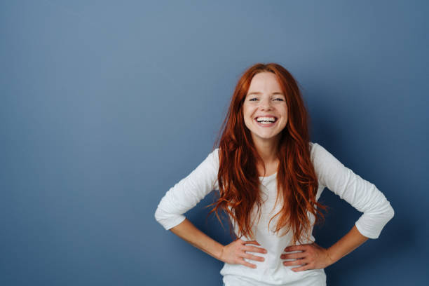 istock Young woman having a good giggle 1251305998