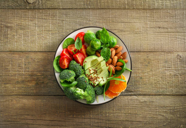 istock Healthy delicious vegetable avocado salad 1251306159
