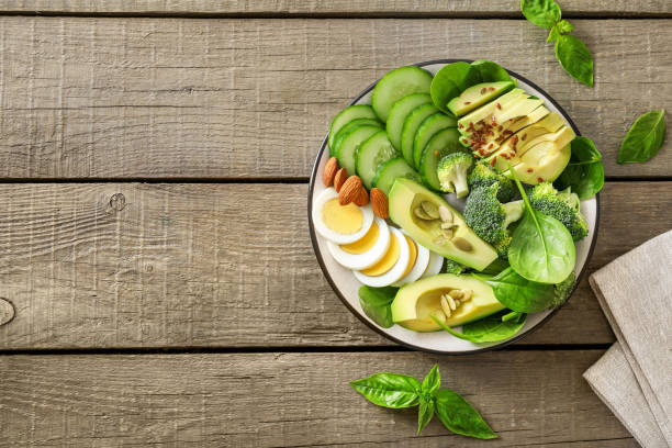 istock Healthy delicious vegetable avocado salad 1251306241