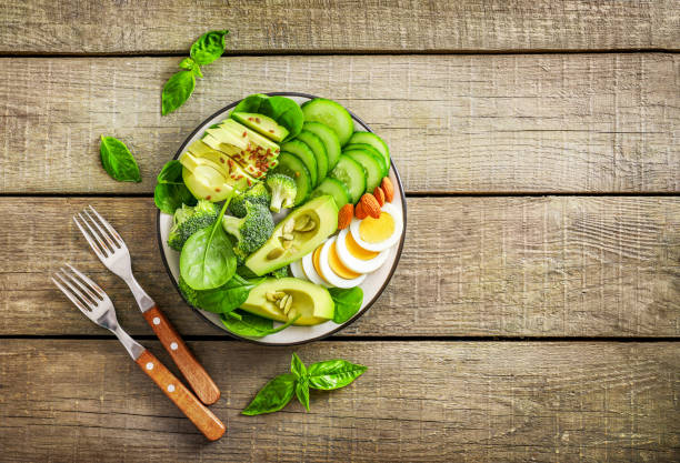 istock Healthy delicious vegetable avocado salad 1251306255