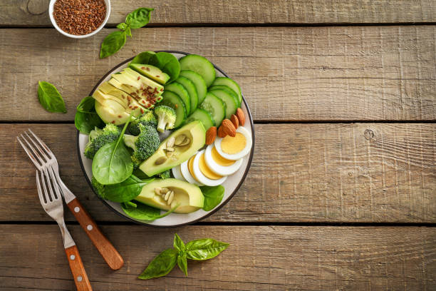 istock Healthy delicious vegetable avocado salad 1251306265